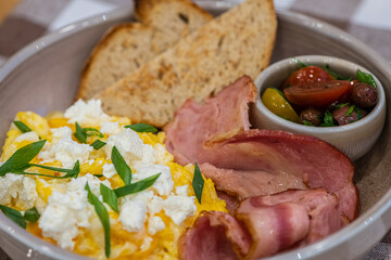 Delicious breakfast with eggs, bacon, cheese and more
