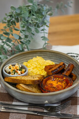 Delicious breakfast with eggs, bacon, cheese and more