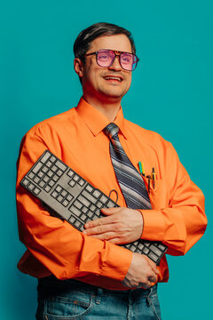 Retro portrait of a stylish programmer holding a keyboard