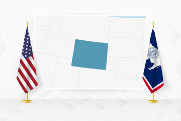 Map of Wyoming and flags of Wyoming on flag stand.