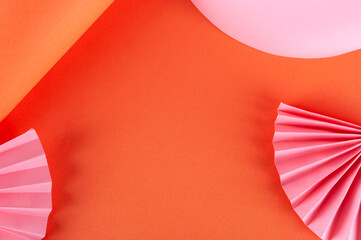 Interesting background of multi-colored paper figures.