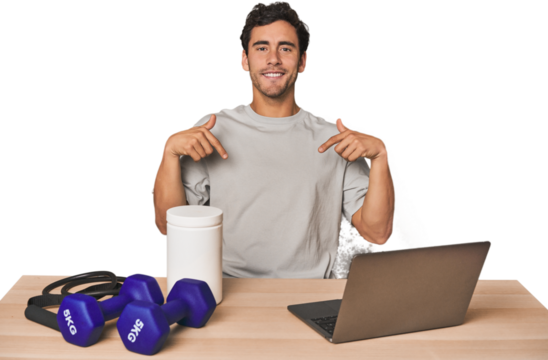 Hispanic trainer planning workout points down with fingers, positive feeling.