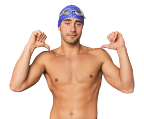 Young Hispanic man with swim gear feels proud and self confident, example to follow.