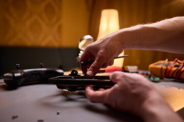 User Engaging in the Repair and Restoration of a Device Comprehensive Electronics Work