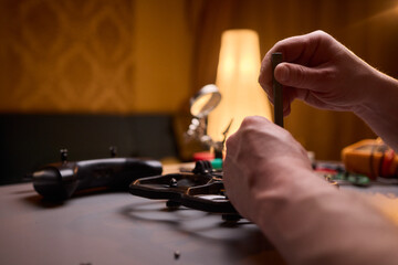 User Engaging in the Repair and Restoration of a Device Comprehensive Electronics Work