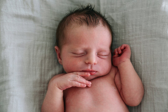 Baby girl sleeping in crib