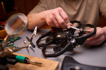 Conducting Detailed and Precise Repair Work Using Various Tools and Electronic Components