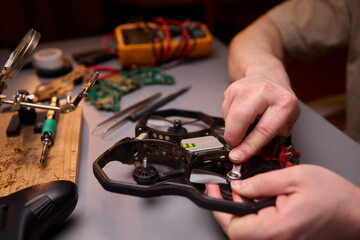 Conducting Detailed and Precise Repair Work Using Various Tools and Electronic Components
