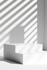 Minimalist white steps casting shadows in a modern space, creating a serene atmosphere with natural light and geometric lines.