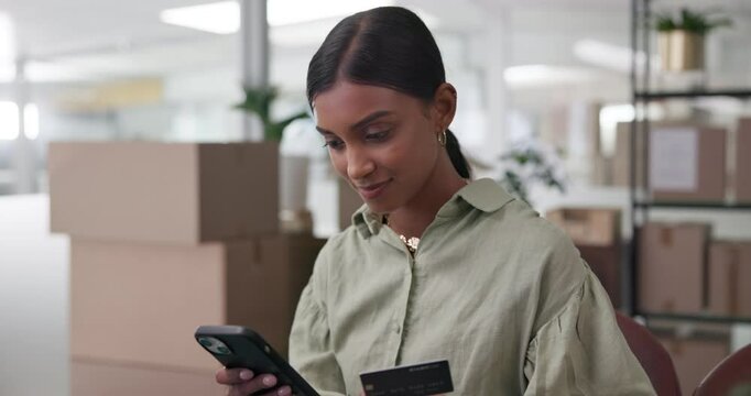 Woman, boxes and credit card for logistics with phone, smile or fintech for payment, shipping and supply chain. People, banking and smartphone with e commerce, cargo and scroll on app at warehouse