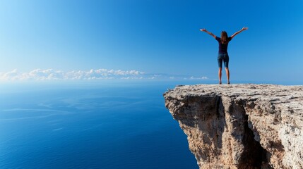 Triumphant View: A lone woman stands at the precipice of a dramatic cliff overlooking the vast expanse of the ocean, arms outstretched in a gesture of triumph and liberation.