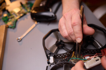 The detailed Drone Repair Process carried out meticulously in a specialized workshop setup