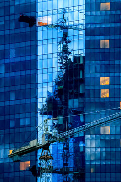 Reflections of a crane in an office building, Tallinn, Estonia