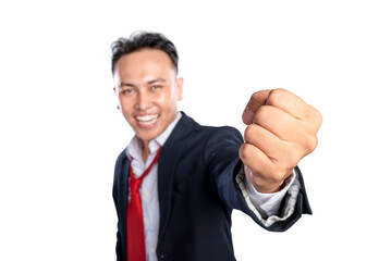 Portrait of an Asian businessman raising hands with an excited expression isolated over a white background. Concept of Indonesian business, entrepreneur, and successful