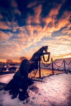 Sunrise over a Metal sculpture along the waterfront in winter, Klaipeda, Lithuania