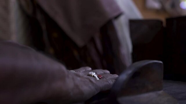 Close up of handmade of Lac bangle making in progress