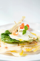 Pane carasau from Sardinia region whit Philadelphia cheese and parmigiano reggiano
