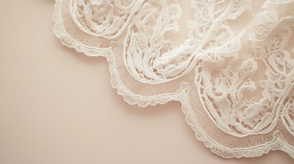Obraz premium Elegant white lace fabric detail on beige background
