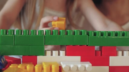 happy family. little kid child engaged lesson with psychologist. kid play game constructor. children development motor skills hand finger. colorful game children. educational program kindergarten