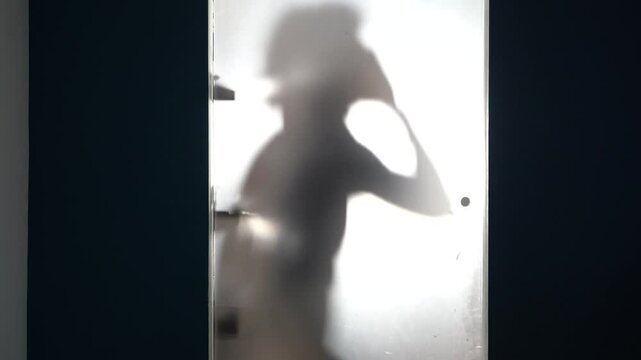 hands and body of raped woman silhouette- domestic family sexual violence at home in apartment - increase in rape and gender-based abuse - shock and fear due to a feminicide and suicide for depression