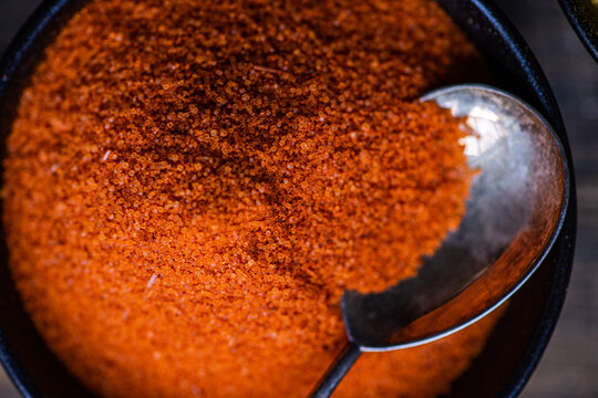 Close-up overhead view of a bowl of paprika