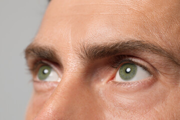 Closeup view of man with green eyes
