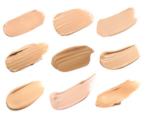 Liquid foundation of different shades. Samples on white background, set