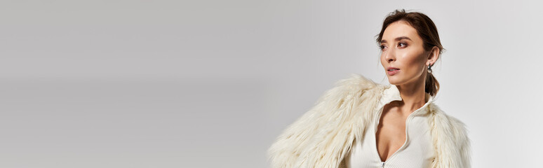 Elegant young woman showcasing contemporary attire fashion in a chic studio setting