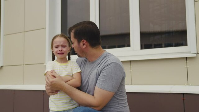 little girl was offended her dad. conversation between little child father. kid upset badly behaves without obeying parent. man explain his daughter rules conduct. tear baby eye. crying child dream