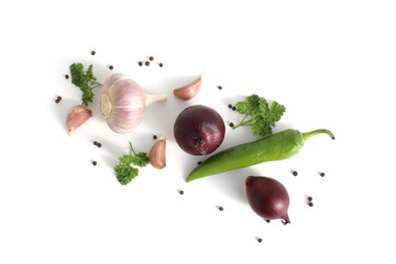 Fresh ripe harvest of vegetables lies on a white isolated background.