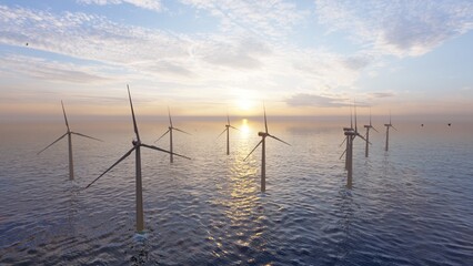 Windmill park. Offshore wind turbines farm on the ocean. Sustainable energy production. Green Energy, clean power, clean energy concept.	
