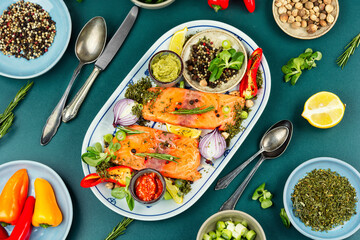 Raw salmon fish and spices.