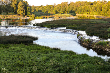 Landscape view with river Venta historic rapid - widest rapid in Europe.