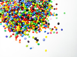 Colorful masterbatch granule, mix color polypropylene polymer granules, cold cutting type granule texture, isolated on white background, for industrial plastic company profile product catalog design