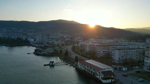 Orsova City  is beautiful city located in western Romania , a travel destination  on the shore of the Danube river , aerial view.