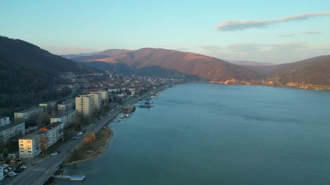 Orsova City  is beautiful city located in western Romania , a travel destination  on the shore of the Danube river , aerial view.