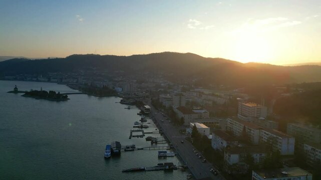 Orsova City  is beautiful city located in western Romania , a travel destination  on the shore of the Danube river , aerial view.