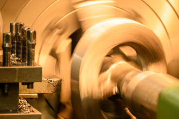 The lathe machine rough cutting the cast iron parts.