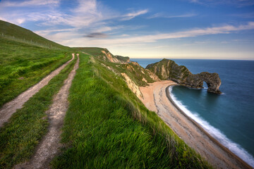 Beautiful blue skies on a summer day at Durdledoor on The Jurassic Coast, Dorset, UK.