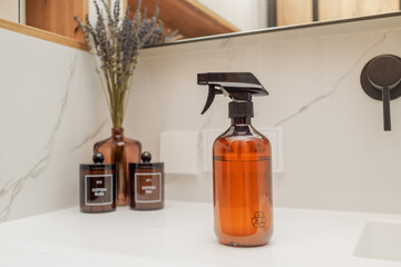 Organization of space on the sink in the bathroom. Decor and containers for patches