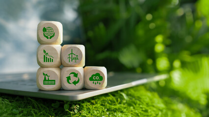 Wooden blocks with green environmental icons for ESG, Concept of World sustainable environment,...