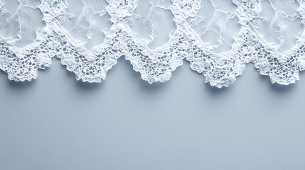 White delicate lace fabric on a blue background