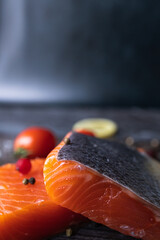 photo of fresh salmon with lemon, allspice and spices