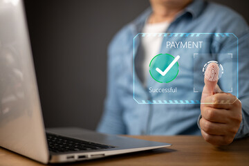 A person uses a biometric fingerprint scan for an online payment on a laptop.futuristic digital interface displays PAYMENT Successful with a green checkmark, symbol secure transactions.