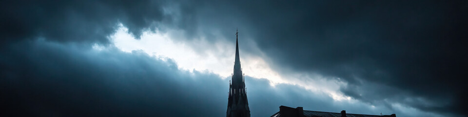 Fototapeta premium Church Steeple Silhouette Against Storm Clouds