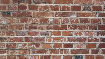 Fototapeta premium brown red brick wall close up