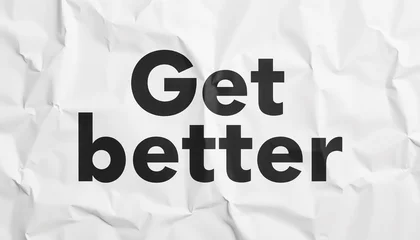 Fotobehang Crumpled paper background with bold text "Get better" for motivation and inspiration © Vitar