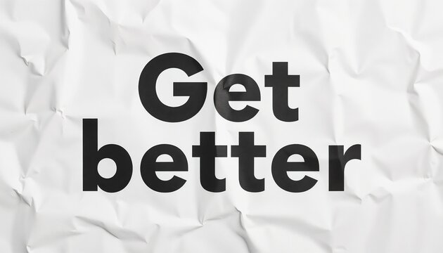 Crumpled paper background with bold text "Get better" for motivation and inspiration