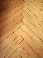 Surface and texture of old parquet on the floor in an ancient building. Photo taken on a mobile phone
