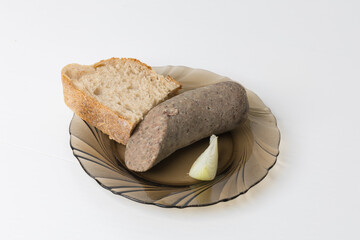 Czech specialty - pork meat products for eating..Homemade tlacenka, jitrnice, cracklings, bread, fried lard
